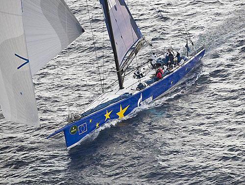 Igor Simcic's Esimit Europa 2 passing Stromboli, during the 31st Rolex Middle Sea Race. Photo copyright Rolex and Kurt Arrigo.