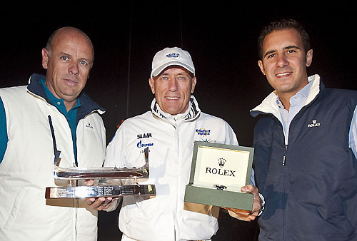 Line Honours Presentation, L-R: Georges Bonello DuPuis (RMSR Commodore), Igor Simcic (owner of Esimit Europa 2) and Malcolm Lowell Jr. from Edwards' Lowell Georges Bonello Dupuis, Commodore Royal Malta Yacht Club. Photo copyright Rolex and Rene Rossignaud.