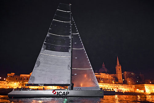 Mike Slade's ICAP Leopard approaching the finish line for the 31st Rolex Middle Sea Race. Photo copyright Rolex and Kurt Arrigo.