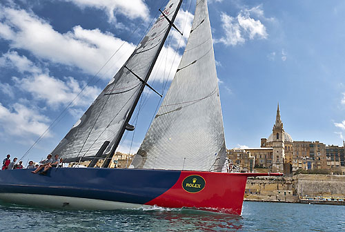 Vladimir Prosikhin's Volvo 70 E1, arrives at the finish line of the 31st Rolex Middle Sea Race. Photo copyright Rolex and Rene Rossignaud.