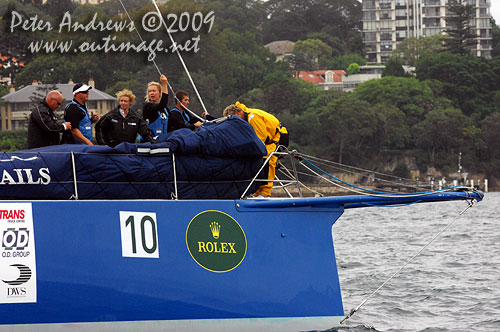 Sophie Ciszek seen on the bow of Grant Warrington’s ill-fated Etihad Stadium, after pulling out of the Rolex Sydney Hobart 2009. Photo copyright Peter Andrews, Outimage Australia.