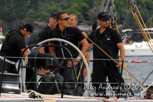 Geoff Huegill standing behind the helm will be a grinder on Investec Loyal, for the Rolex Sydney Hobart Yacht Race 2010. To the far left of Geoff is former Vice Captain of the Australian 2003 Rugby World Cup Team and NSW Waratahs captain, Phil Waugh. Photo copyright Peter Andrews, Outimage Australia.