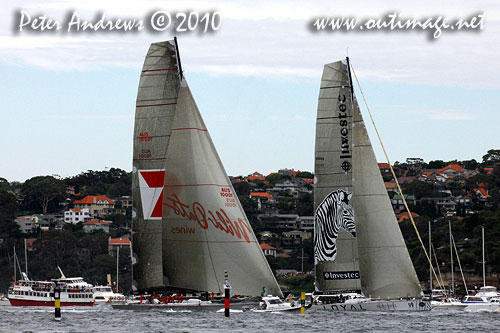 Investec Loyal just ahead of Wild Oats XI passing the Sow and Pigs Reef, after the start of the Rolex Sydney Hobart 2010. Photo copyright Peter Andrews, Outimage Australia.