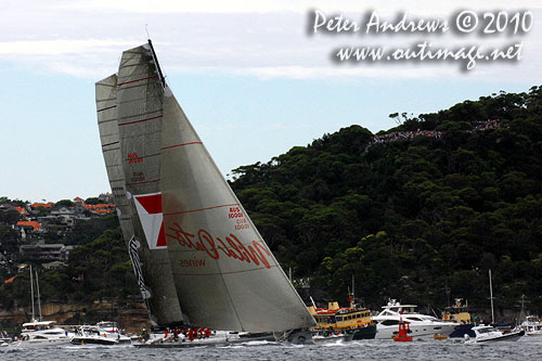 Wild Oats XI passing Investec Loyal, after the start of the Rolex Sydney Hobart 2010. Photo copyright Peter Andrews, Outimage Australia.