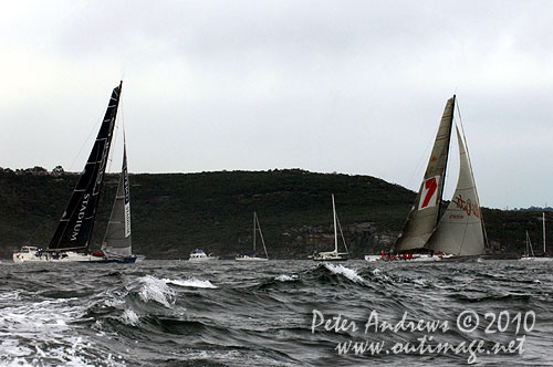 Wild Oats XI and Wild Thing approaching the heads, after the start of the Rolex Sydney Hobart 2010. Photo copyright Peter Andrews, Outimage Australia.