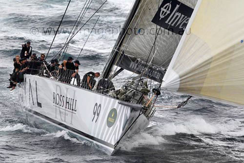 Sean Langman and Anthony Bell’s Investec Loyal, offshore Sydney after the start of the Rolex Sydney Hobart 2010. Photo copyright Howard Wright, IMAGE Professional Photography.