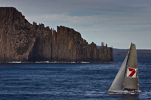 Line Honours Winner Wild Oats XI passing the Tasmania Peninsula's iconic Organ Pipes, during the Rolex Sydney Hobart Yacht Race 2010. Photo copyright Rolex and Carlo Borlenghi.