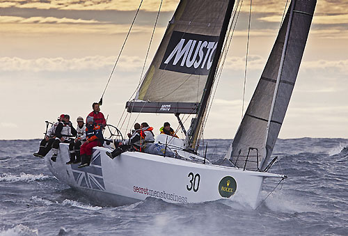 Geoff Boettcher’s South Australian yacht Secret Mens’ Business 3.5 crossing Storm Bay during the Rolex Sydney Hobart Yacht Race. Photo copyright Rolex and Daniel Forster.