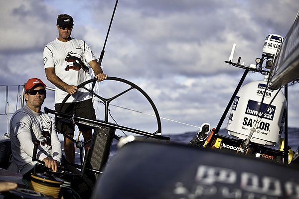 Jonathan Swain on the helm and Brad Jackson on the traveler. PUMA Ocean Racing powered by BERG during leg 1 of the Volvo Ocean Race 2011-12, from Alicante, Spain to Cape Town, South Africa. Photo Amory Ross / PUMA Ocean Racing / Volvo Ocean Race.