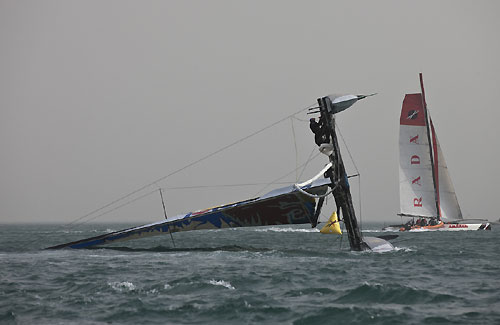 Team Red Bull Extreme Sailing capsizing on day 2 of racing, during the Extreme Sailing Series 2011, Qingdao, China. Photo copyright Lloyd Images. 