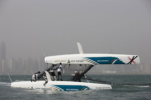 Oman Air capsizing on day 2 of racing, during the Extreme Sailing Series 2011, Qingdao, China. Photo copyright Lloyd Images. 