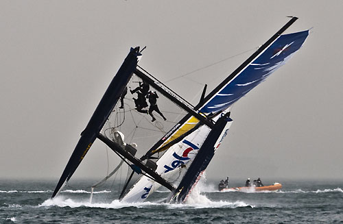 Red Bull Extreme Sailing capsize in race 4 on day 3, during the Extreme Sailing Series 2011, Qingdao, China. Photo copyright Giordana Pipornetti, Niceforyou.