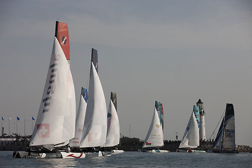Fleet flying spinnakers racing downwind, during the Extreme Sailing Series 2011, Qingdao, China. Photo copyright Lloyd Images.