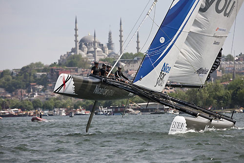 NiceForYou flying high on Day 1 of Act 3, during the Extreme Sailing Series 2011, Istanbul, Turkey. Photo copyright Lloyd Images.