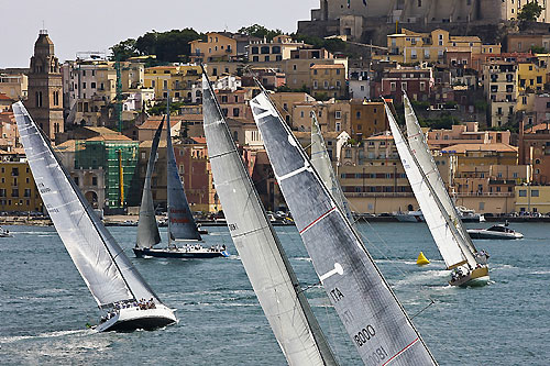The fleet after the start with Gaeta in the background, during the Rolex Volcano Race, Capri, Italy. Photo copyright Rolex and Carlo Borlenghi.