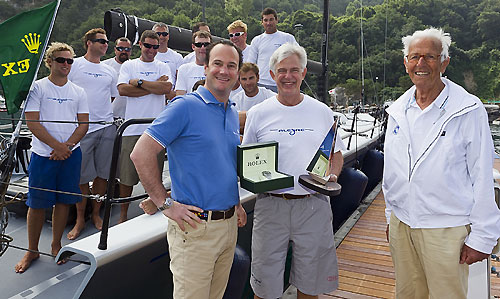 Line Honours Trophy awarded to Alegre with the crew in the background, Lionel Schurch (Rolex SA), Andres Soriano (Alegre) and Gianfranco Alberini (Secretary General IMA), during the Rolex Capri Sailing Week and Rolex Volcano Race, Capri, Italy. Photo copyright Rolex and Carlo Borlenghi.