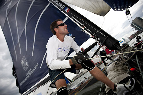 Bowman Hervé Cunningham in action onboard Groupe Edmond de Rothschild, during the Extreme Sailing Series 2011, Boston, USA. Photo Copyright Lloyd Images.