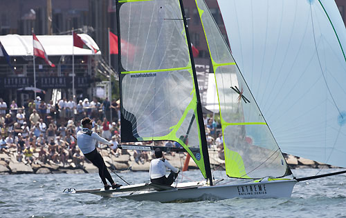 Olympic 49er class racing in front of the race village between Extreme 40 racing, during the Extreme Sailing Series 2011, Boston, USA. Photo Copyright Lloyd Images.
