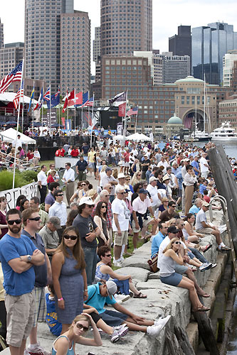 Spectators line the shore in front of the downtown Boston skyline, during the Extreme Sailing Series 2011, Boston, USA. Photo Copyright Lloyd Images.