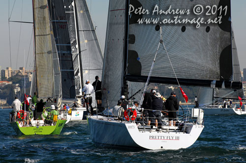 Colin and Gladys Woods' Cookson 50 Pretty Fly III and Bruce McKay's Sayer 12 Mod Wasabi, ahead of the start of the Audi Sydney Gold Coast 2011. Photo copyright Peter Andrews, Outimage Australia.