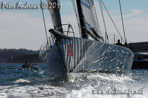 Anthony Bell's 100 ft maxi Investec Loyal on Sydney Harbour, after the start of the Audi Sydney Gold Coast 2011. Photo copyright Peter Andrews, Outimage Australia.