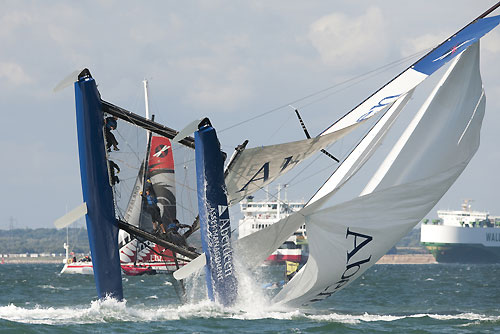 A dramatic capsize for Aberdeen Asset Management in Race 6 of Day 3 of the Extreme Sailing Series 2011, Cowes, United Kingdom. Photo copyright Lloyd Images.
