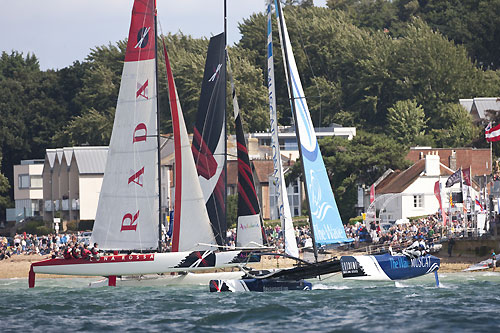 Luna Rossa and The Wave-Muscat in close combat metres from the shore at the Extreme Sailing Series 2011, Cowes, United Kingdom. Photo copyright Lloyd Images.