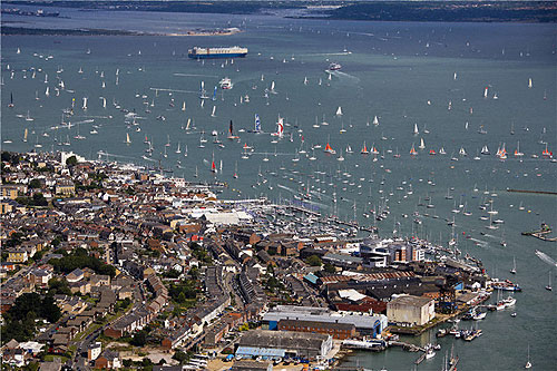 An aerial shot of the record fleet off Cowes, during the start of the Rolex Fastnet Race 2011. Photo copyright Rolex and Carlo Borlenghi.