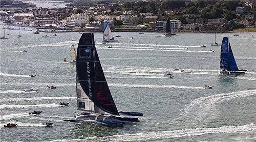 The first to start were the multihulls, including Maxi Banque Populaire and Gitana 11, during the Rolex Fastnet Race 2011. Photo copyright Rolex and Carlo Borlenghi.