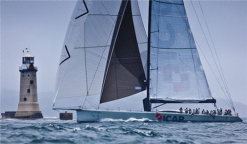 Mike Slade's ICAP Leopard crossing the finish line in Plymouth, during the Rolex Fastnet Race 2011. Photo copyright Rolex and Carlo Borlenghi.