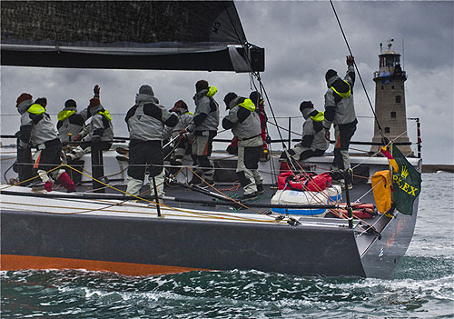 Franck Noel's Near Miss crossing the finish line in Plymouth, during the Rolex Fastnet Race 2011. Photo copyright Rolex and Carlo Borlenghi.
