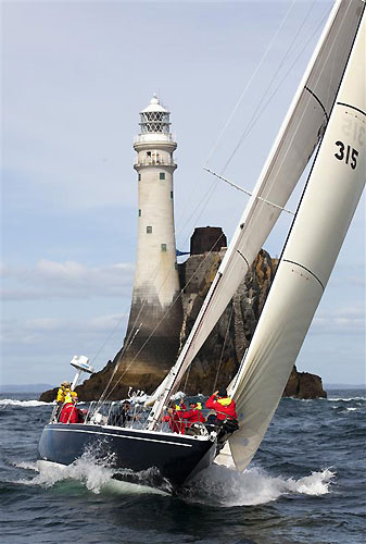 Rives Potts' McCurdy Rhodes 48 Carina (USA) at Fastnet Rock, during the Rolex Fastnet Race 2011. Photo copyright Rolex and Daniel Forster.