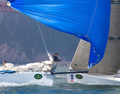The bowman on Tim Fuller's J 125 Resolute, trying to retrieve the take down line on Day 1, during the Rolex Big Boat Series, San Francisco, California. Photo copyright Rolex and Daniel Forster.
