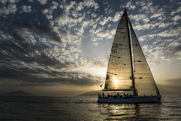 Grard Logel's Arobas (FRA), is welcomed by the sunrise for her arrival to Capri to complete leg one of the Rolex Volcano Race 2012. Photo copyright Kurt Arrigo for Rolex.