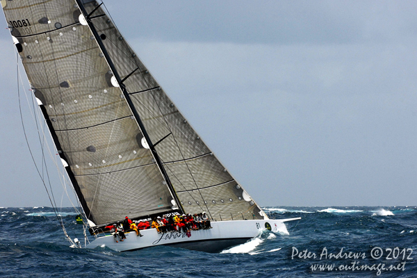 Peter Millard and John Honan's Bakewell-White 30m Maxi Lahana, outside the heads of Sydney Harbour after the start of the 2012 Sydney Hobart Yacht Race. Photo copyright Peter Andrews, Outimage Australia.