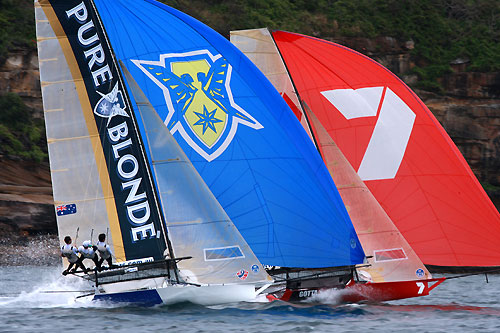 Pure Blonde and Gotta Love 7 on a tight spinnaker run, during the 18 Footers Mick Scully Memorial Trophy on Sydney Harbour, October 24, 2010. Photo copyright the Australian 18 Footers League.