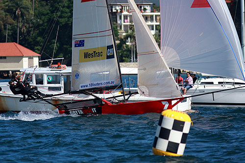 Gotta Love It 7 takes is first over the line in Race 3 of the New South Wales Championship on Sydney Harbour. Photo copyright The Australian 18 Footers League.