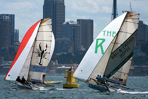 Red Claw Wines and Rag & Famish Hotel providing some spinnaker action on Sydney Harbour, during last year's Syd. Barnett memorial Trophy. Photo copyright Australian 18 Footers League.