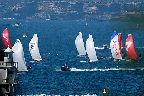 The first spinnaker run, during Race 4 of the Australian Championship, part of the 2011 Australia Day Regatta on Sydney Harbour. Photo copyright Australian 18 Footers League.