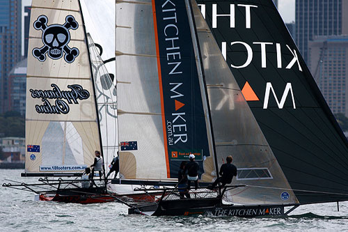 Brett Van Munster's The Kitchen Maker and Jeremy Wilmot's Appliancesonline under spinnaker in light winds, during Race 2 of the Winning Appliances - JJ Giltinan 18ft Skiff Championship on Sydney Harbour, Sunday March 6, 2011. Photo copyright Australian 18 Footers League.