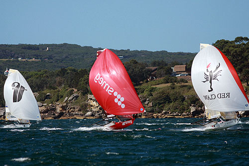 The early leaders on their first spinnaker run, during Race 3 of the Winning Appliances - JJ Giltinan 18ft Skiff Championship on Sydney Harbour, Sunday March 8, 2011. Photo copyright Australian 18 Footers League.