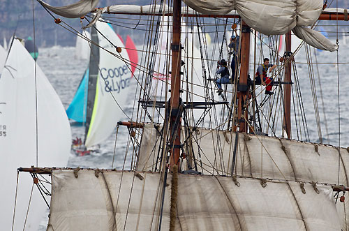 Aloft on the tall ship James Craig with the fleet outside the heads of Sydney Harbour, after the start of the Rolex Sydney Hobart 2010, Australia. Photo copyright Carlo Borlenghi, Rolex.