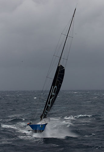 Grant Wharington's Maxi Wild Thing under reduced sail dealing with the conditions of the Tasman Sea, during the Rolex Sydney Hobart Yacht Race 2010, Australia. Photo copyright Carlo Borlenghi, Rolex.