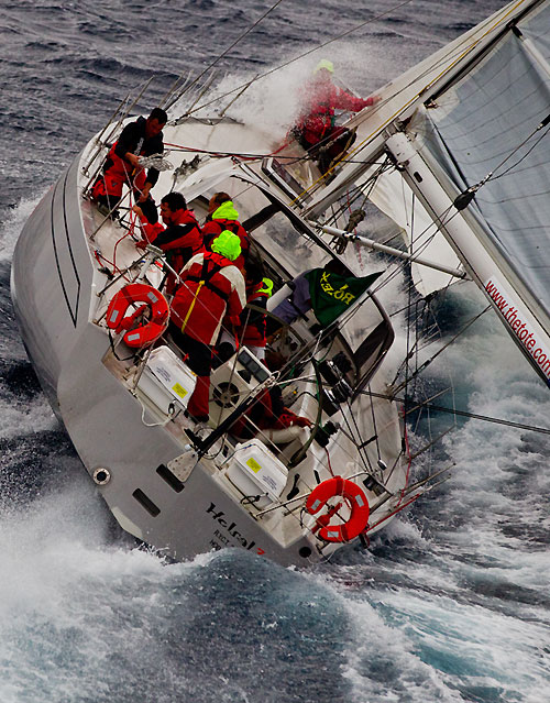 Tony and Rob Fisher's Adams 20 and Tasmanian entry Helsal III, ploughing through the conditions of the Tasman Sea off the New South Wales South Coast, during the Rolex Sydney Hobart Yacht Race 2010, Australia. Photo copyright Carlo Borlenghi, Rolex.