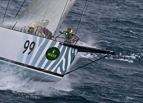 The bowman at work on Sean Langman and Anthony Bell's Elliott Maxi Investec Loyal, out in the Tasman Sea during Rolex Sydney Hobart Yacht Race 2010, Australia. Photo copyright Carlo Borlenghi, Rolex.