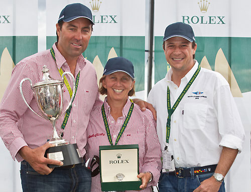 Wild Oats XI skipper Mark Richards, co-navigator Adrienne Cahalan, and Patrick Boutellier from Rolex Australia with the JH Illingworth Trophy and Rolex Yacht-Master timepiece for the Line Honours winner of the Rolex Sydney Hobart Yacht Race 2010, Australia. Photo copyright Carlo Borlenghi, Rolex.