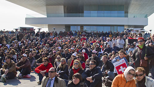 Valencia, Spain, February 12, 2010. Alinghi fans at the foredeck building on day 5 during Race 1 of the 33rd America's Cup. Photo copyright Luca Buttò / Alinghi.