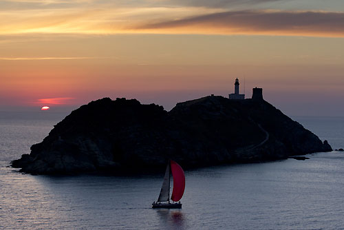 Paolo Podesta's Grand Soleil 50 One at Giraglia Rock at sunset, during the Giraglia Rolex Cup 2011, Saint-Tropez, France, June 18-25. Photo copyright Rolex and Carlo Borlenghi.