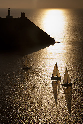The Fleet at Giraglia Rock at sunset, during the Giraglia Rolex Cup 2011, Saint-Tropez, France, June 18-25.  Photo copyright Rolex and Carlo Borlenghi.