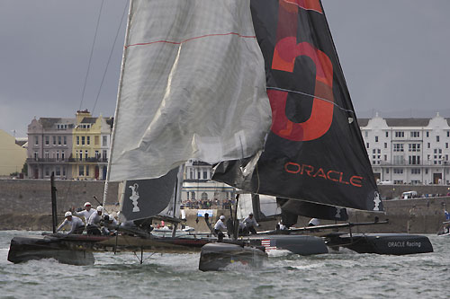 Terry Hutchinson's Artemis Racing and Russell Coutts' ORACLE Racing at the America's Cup World Series, Plymouth, UK, September 10-18, 2011. Photo copyright Morris Adant.